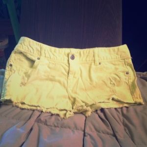 Light green distressed shorts