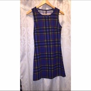 Super cute plaid dress.