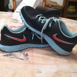 Blue Nike tennis shoes