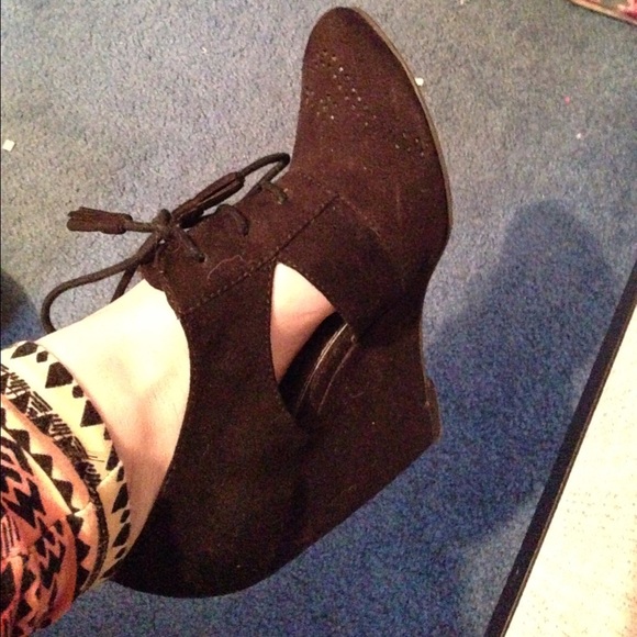 Black suede wedges.