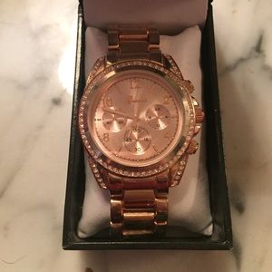 Rosegold Geneva diamond encrusted watch