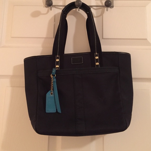 Authentic Coach black and teal handbag.