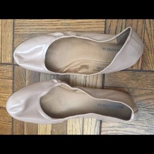 Nude colored patent leather flats