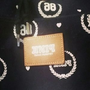 Black VS Backpack With White Designs