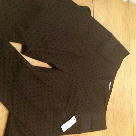 Black pants with black polka dots