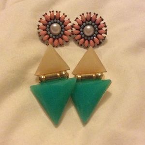 Two pairs of earrings.