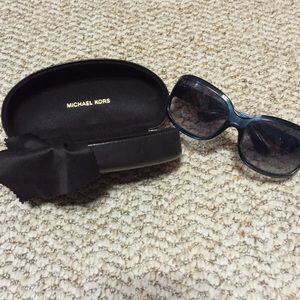 Blue Michael Kors sunglasses.