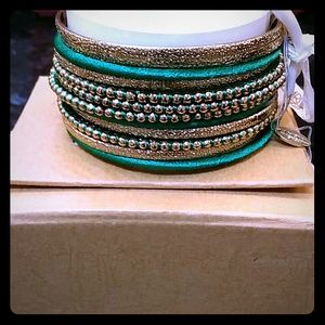 Amrita Singh emerald gold bangle set