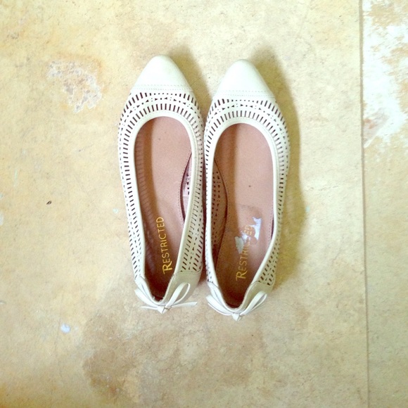 Eggshell colored flats