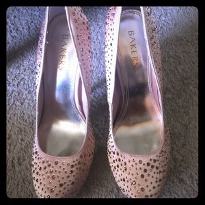 Light pink heels with jewels all through out shoe