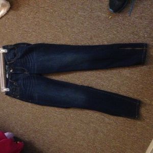 A pair of never worn jeans.
