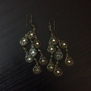 Green dangling earrings
