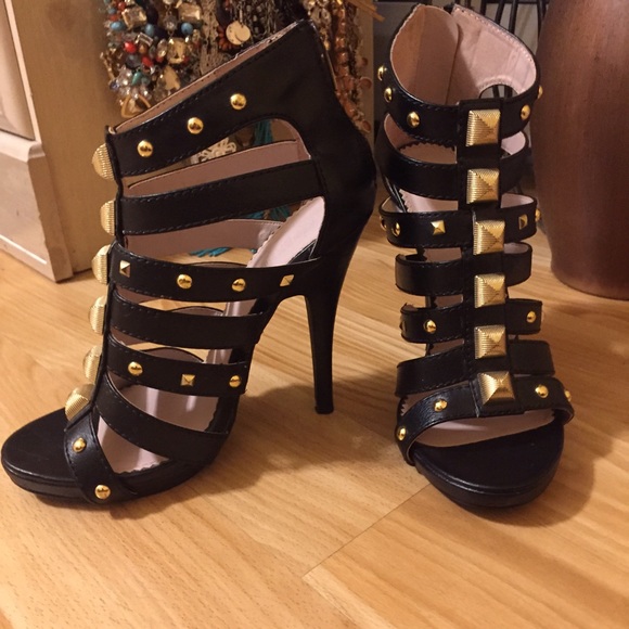 Black leather strap heels with gold studs