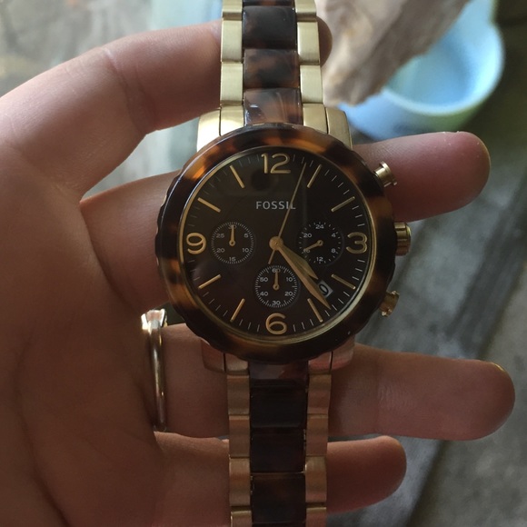 Gold and tortoise fossil watch
