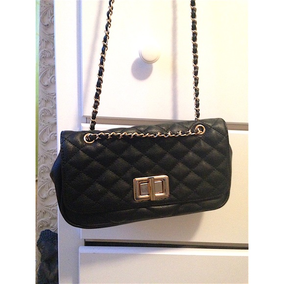 Aldo Bags Black Quilted Aldo Purse With Gold Buckle Poshmark