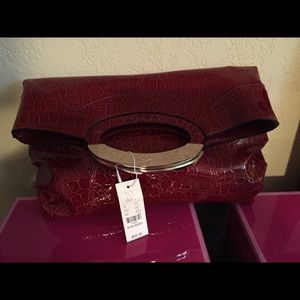 Faux crocodile handbag.