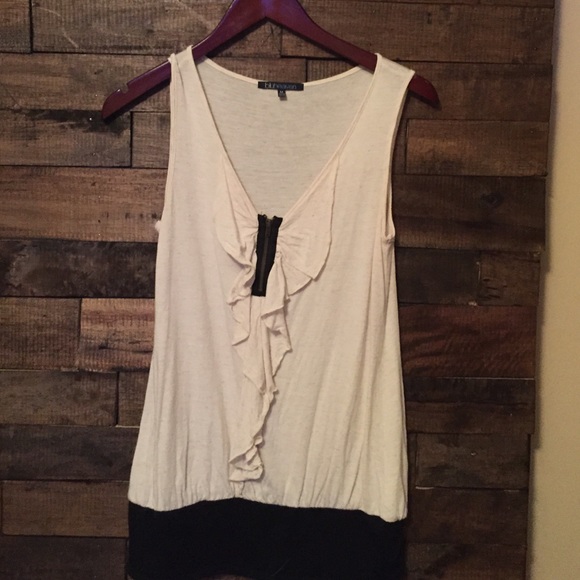 Tan/ black tank top.