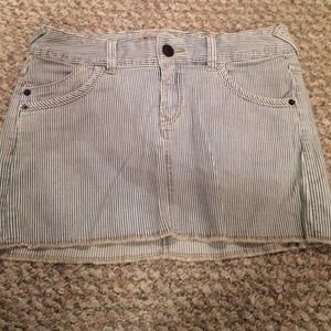 Denim stripe mini skirt.