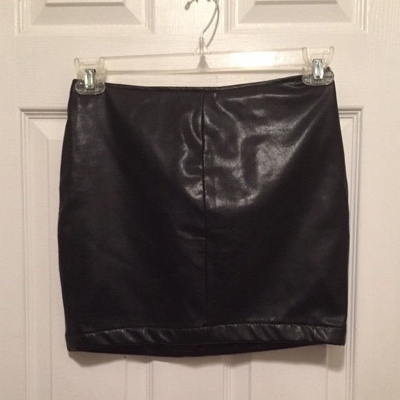 Black faux leather mini skirt.