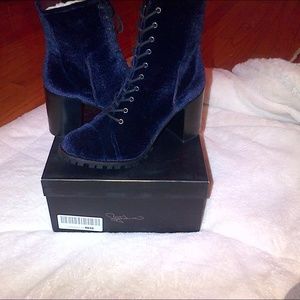 Report signature blue velvet boots.