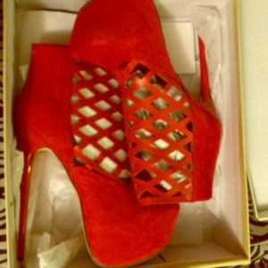 Red suede platform heels