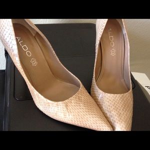 Nude snake pumps