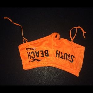 South Beach mesh bright orange shorts