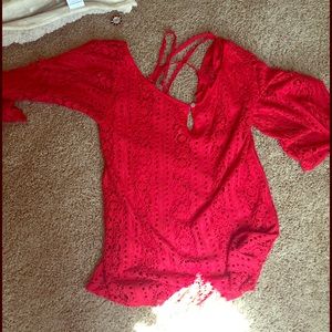 a red free long sleve free people top. worn once.