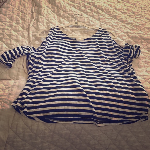 super cute striped top with a cut off on shoulders