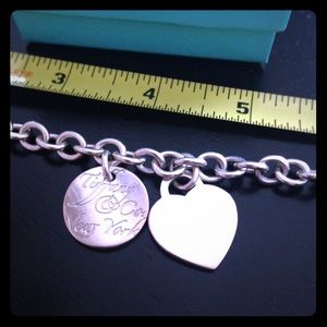 Tiffany & Co. small link bracelet w/ 2 charms