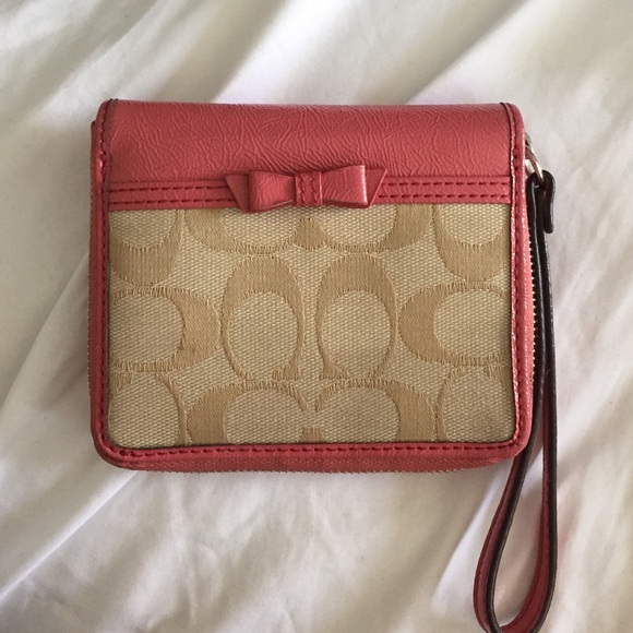 Tan and Pink Coach Wristlet