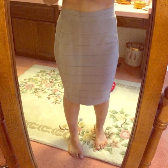 Super cute tan pencil skirt!