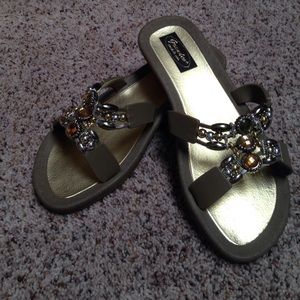 Gold sandals with beaded embellishments