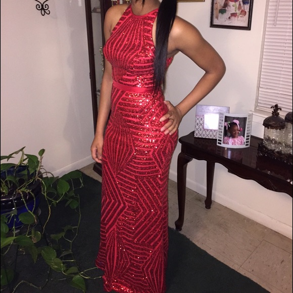 Red tight fitted formal dress with sequence.Size 6