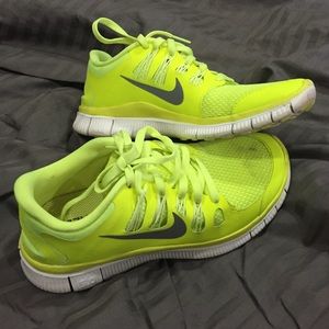 Neon yellow Nike Free 5.0