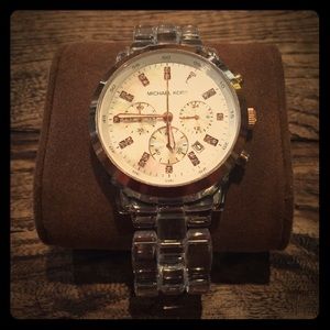 Clear and rose gold large Michael Kors watch.