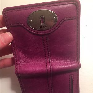 Magenta Fossil bifold wallet.