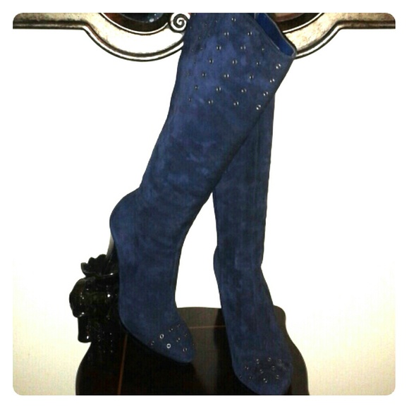 Calvin Klein sued knee boots