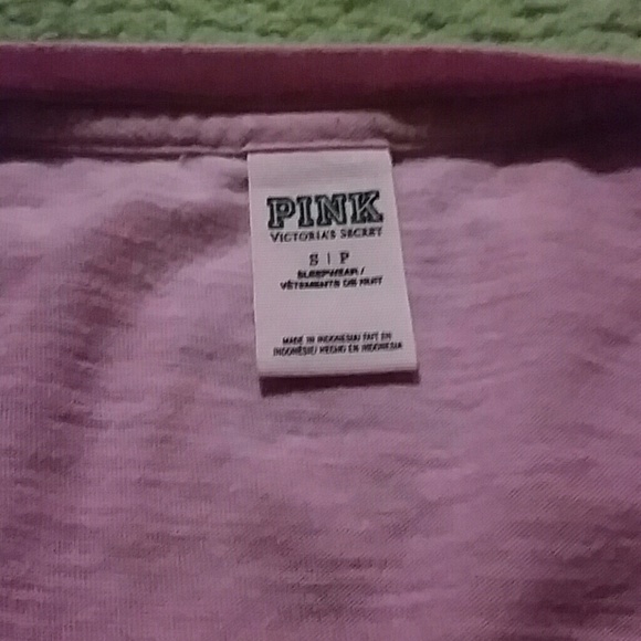 Pink shirt.