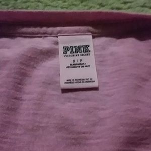 Pink shirt.