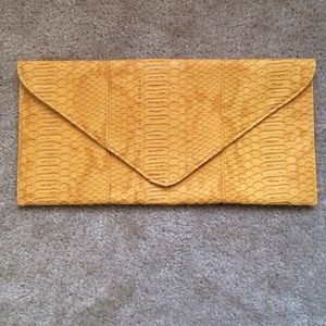 mustard yellow envelope clutch