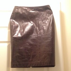 Brown leather skirt.