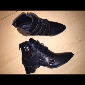 Black four strap ankle boots.