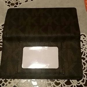 Mk checkbook cover