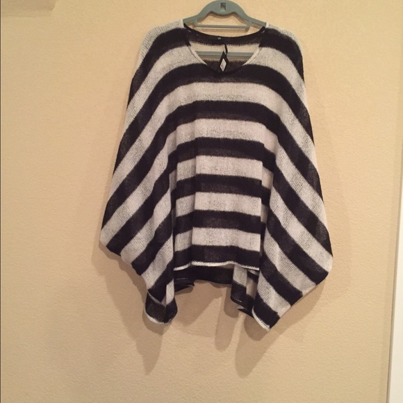 Black and white striped poncho.