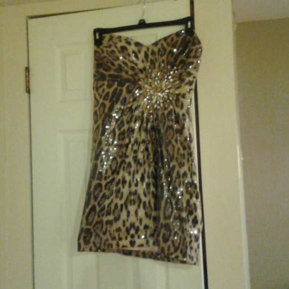 Coctail leopard evening dress.
