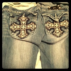 Miss me boot cut size 29/33.  Small hole in knee