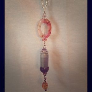FEMININE & TOUGH UPCYCLED bullet casing necklace