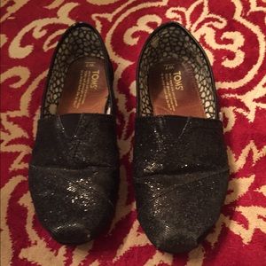 Previously loved black glitter TOMS.