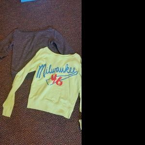 Two cre necks sice small and med